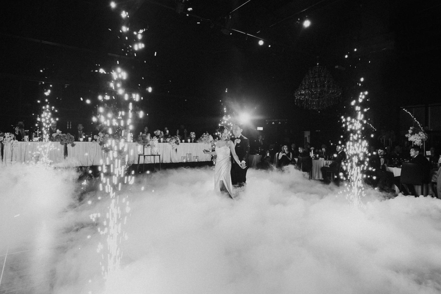 Low smoke and sparklers across the dance floor